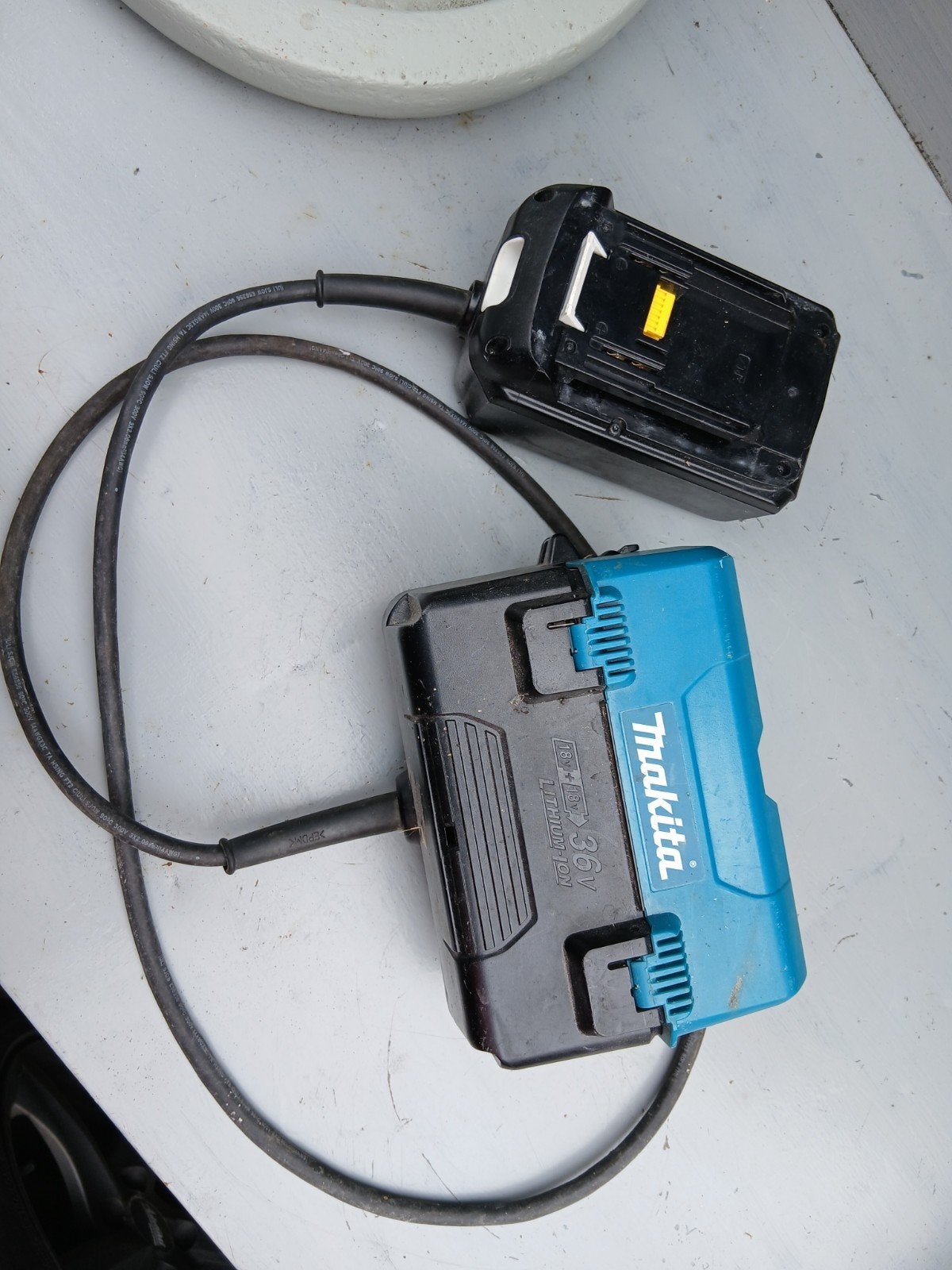 makita accu adapter, Ophalen