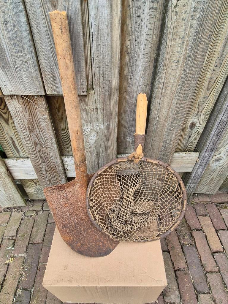 Grindschep en bagger beugel, Ophalen