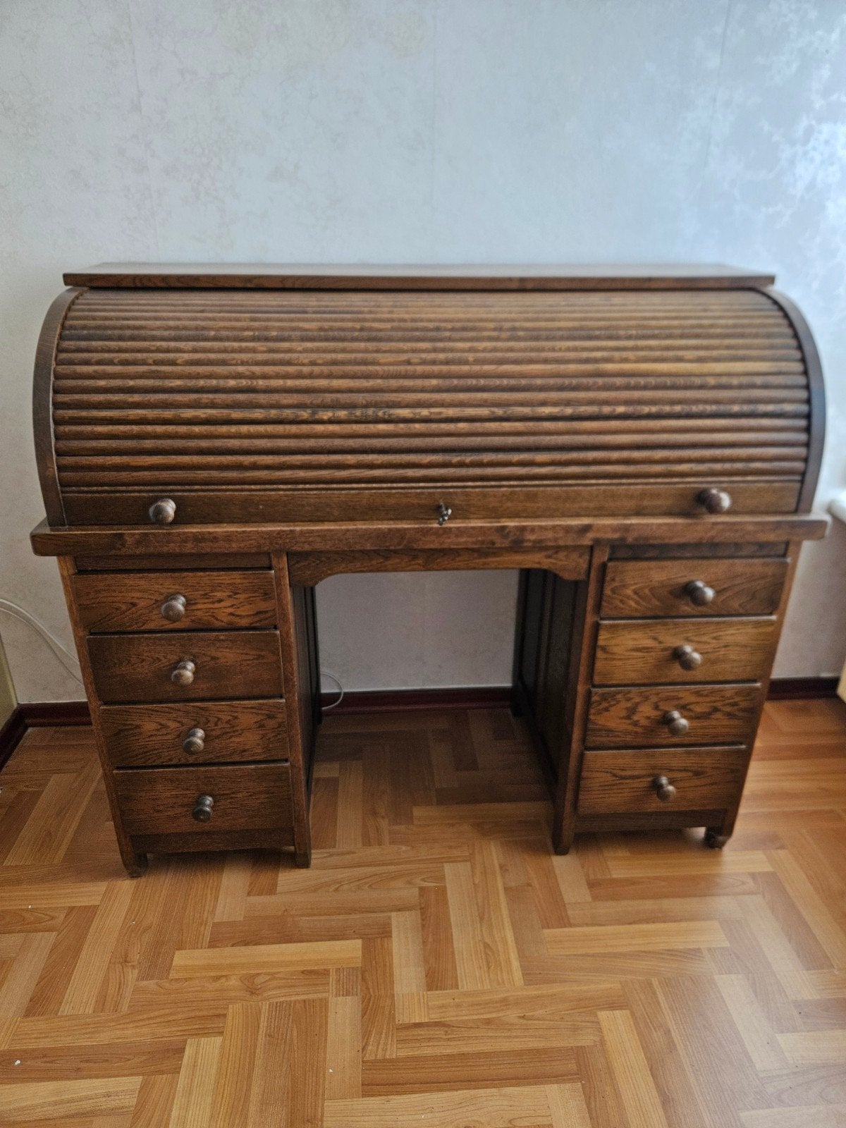 Bureau met rolluik, Ophalen