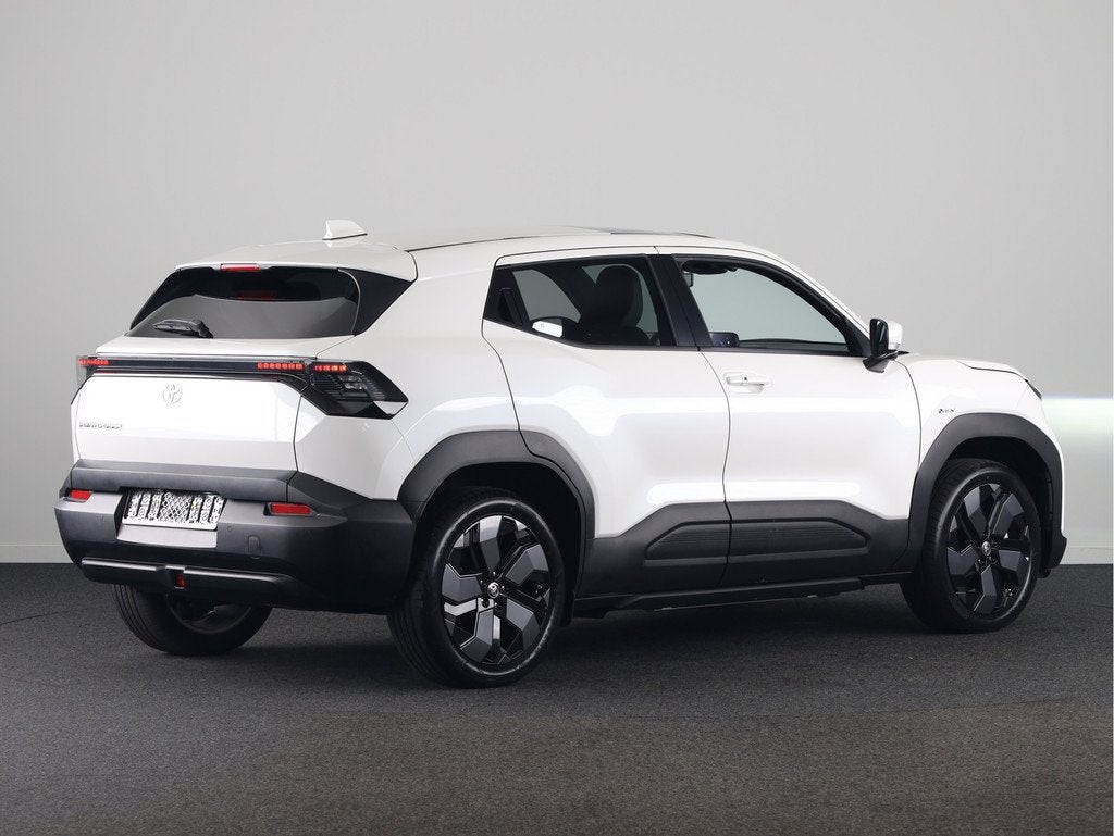 Toyota Urban Cruiser Executive 61 kWh *NIEUW* | Direct lever, Auto's, Toyota, 12 maanden, Leder en Stof, Wit, Origineel Nederlands