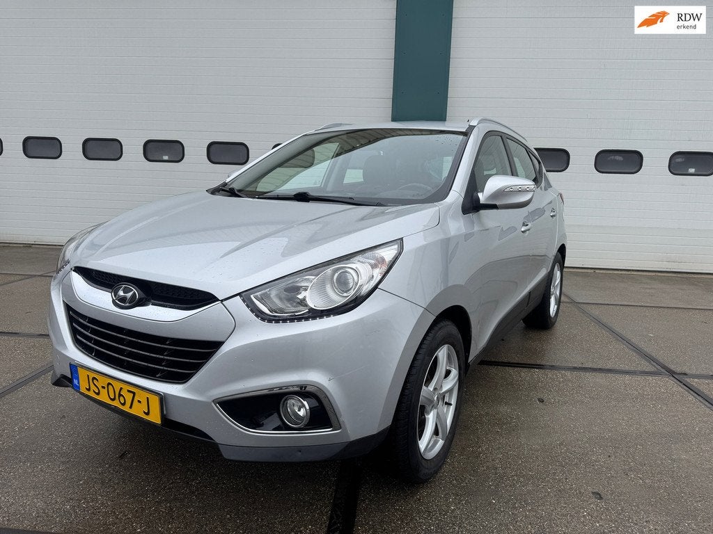 Hyundai Ix35 1.6i GDI Style, Auto's, Hyundai, Euro 5, 135 pk, 4 cilinders, Leder en Stof