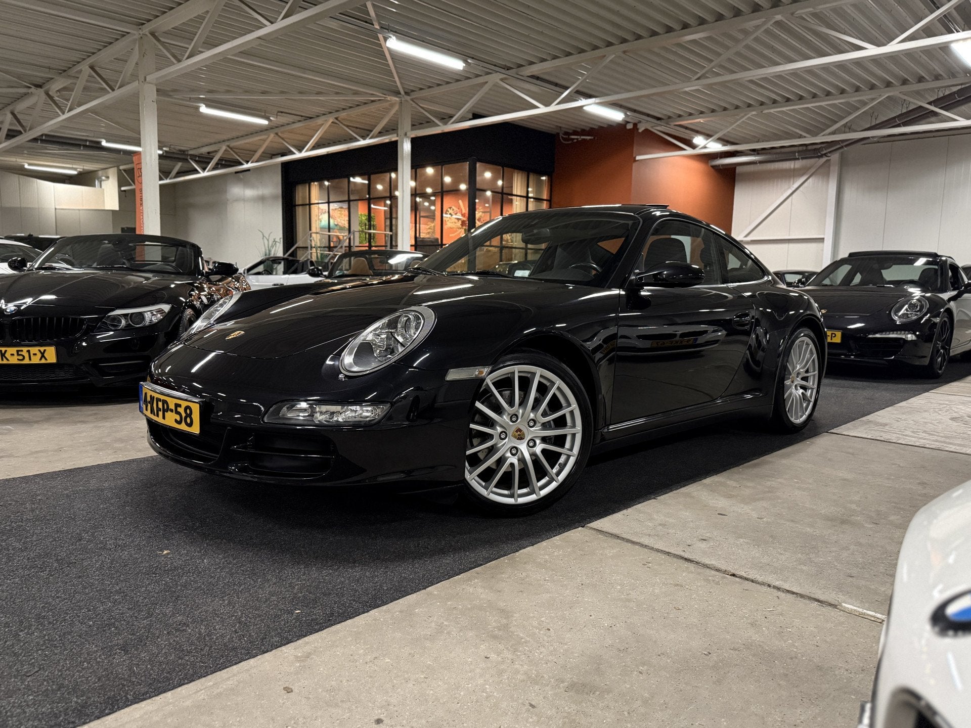 Porsche 911 [997] 3.6 Carrera 4 Coupé Aut. l Schuifdak l Xe, Automaat, Gebruikt, Zwart, 4 stoelen