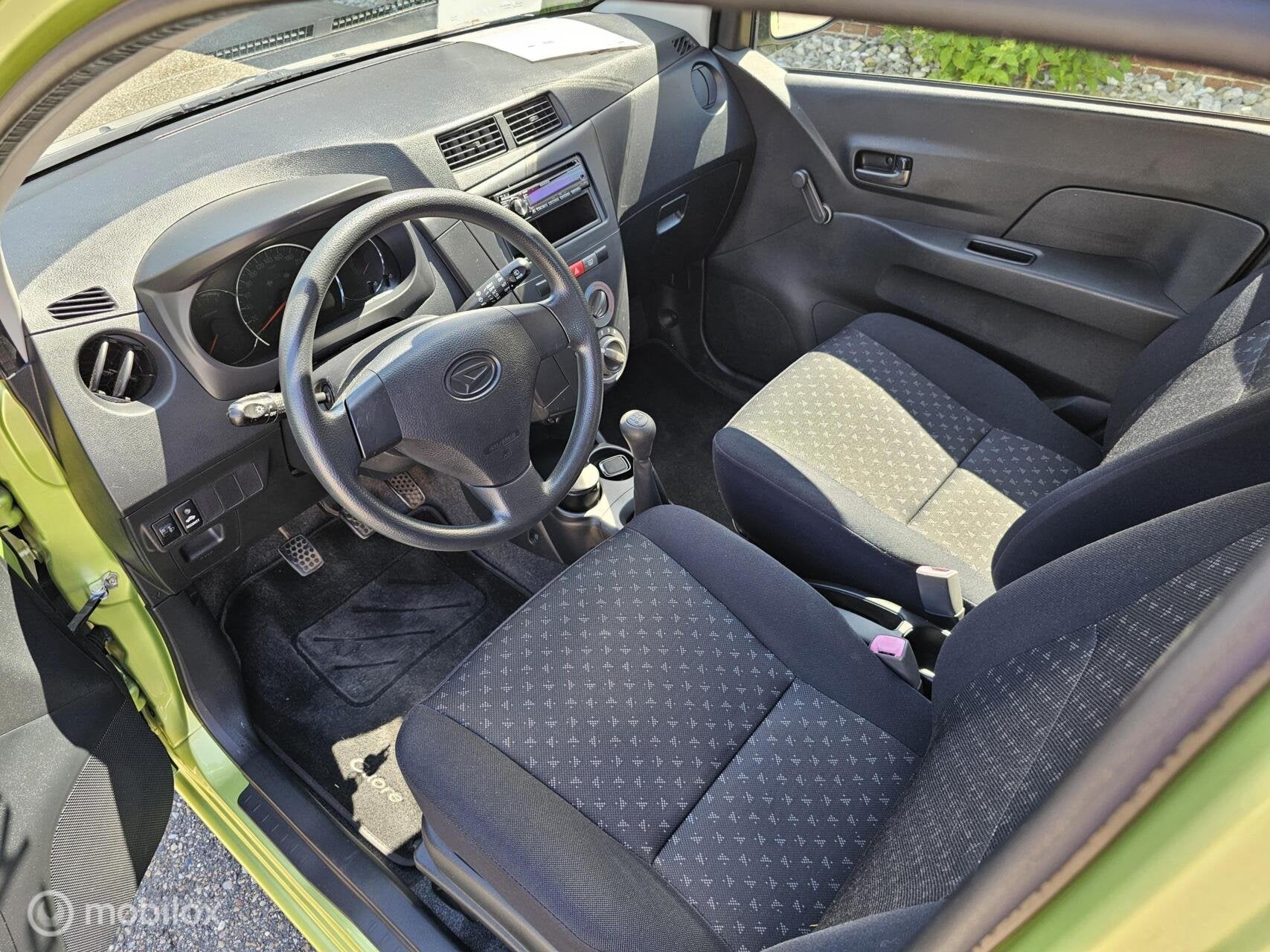 Daihatsu Cuore 1.0 Comfort I nieuwstaat I 66690 km I NAP!, Auto's, Voorwielaandrijving, 18 €/maand, 4 stoelen, Cuore