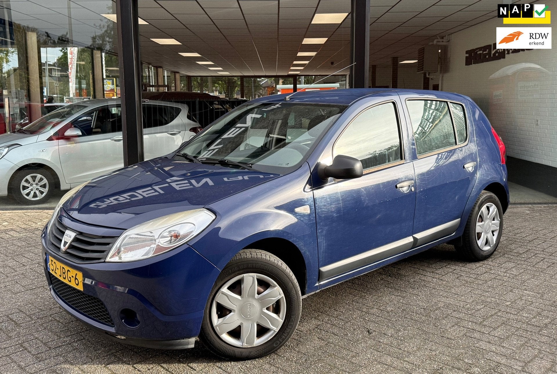 Dacia Sandero 1.2 5drs Ambiance AIRCO | ELEKTR PACK | NAP, Auto's, Voorwielaandrijving, Stof, Gebruikt, Blauw