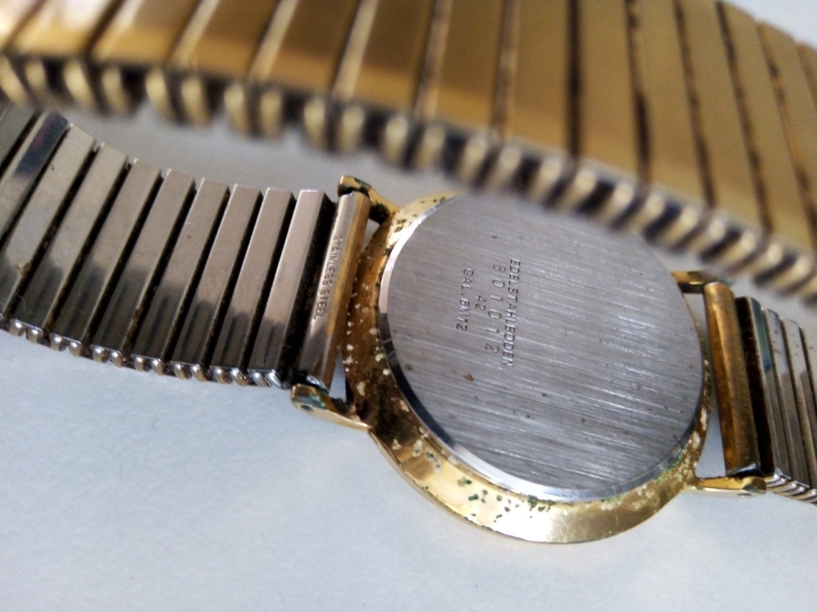 Dugena herenhorloge goudkleurig, Ophalen of Verzenden, Gebruikt, Goud, Overige materialen