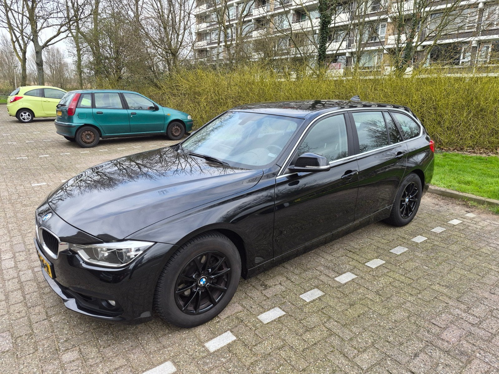 BMW 318i Touring AUT, Executive Navigatie Climate, 2016, Auto's, Automaat, Zwart, 1465 kg, Zwart