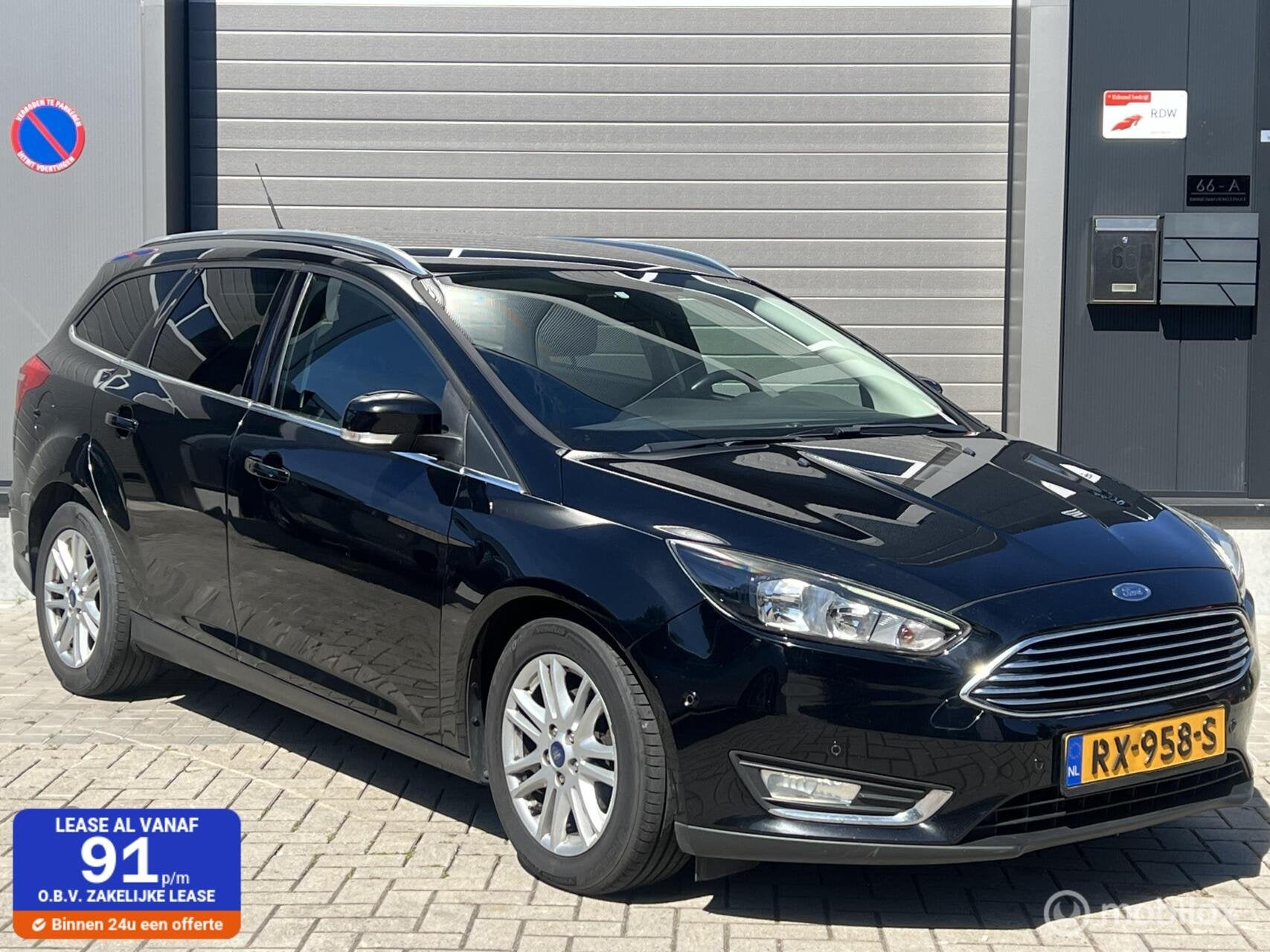 Ford Focus Wagon 1.0 Titanium Garantie !, Auto's, 125 pk, Gebruikt, Euro 6, Zwart