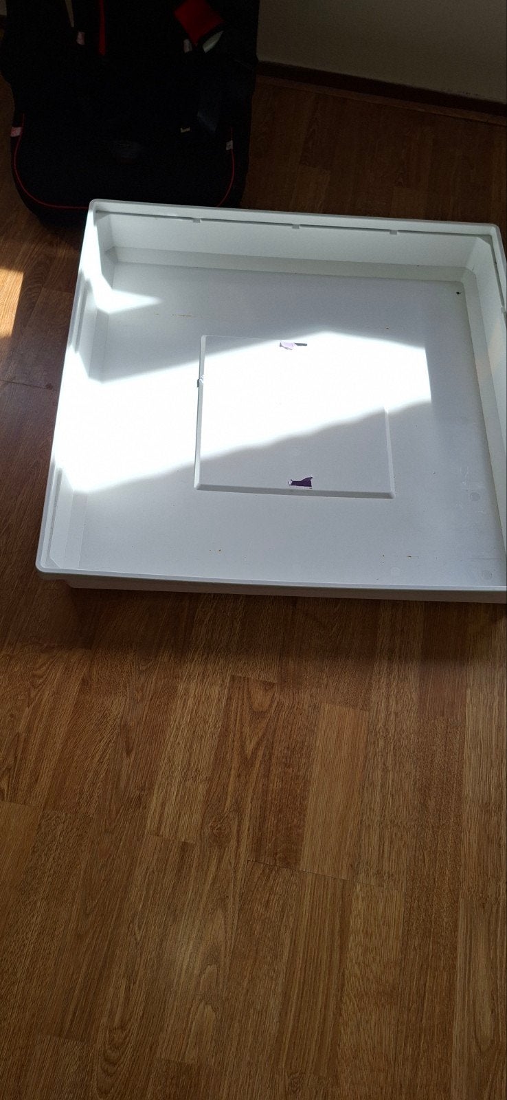 lekbak wasmachine/droger, Ophalen