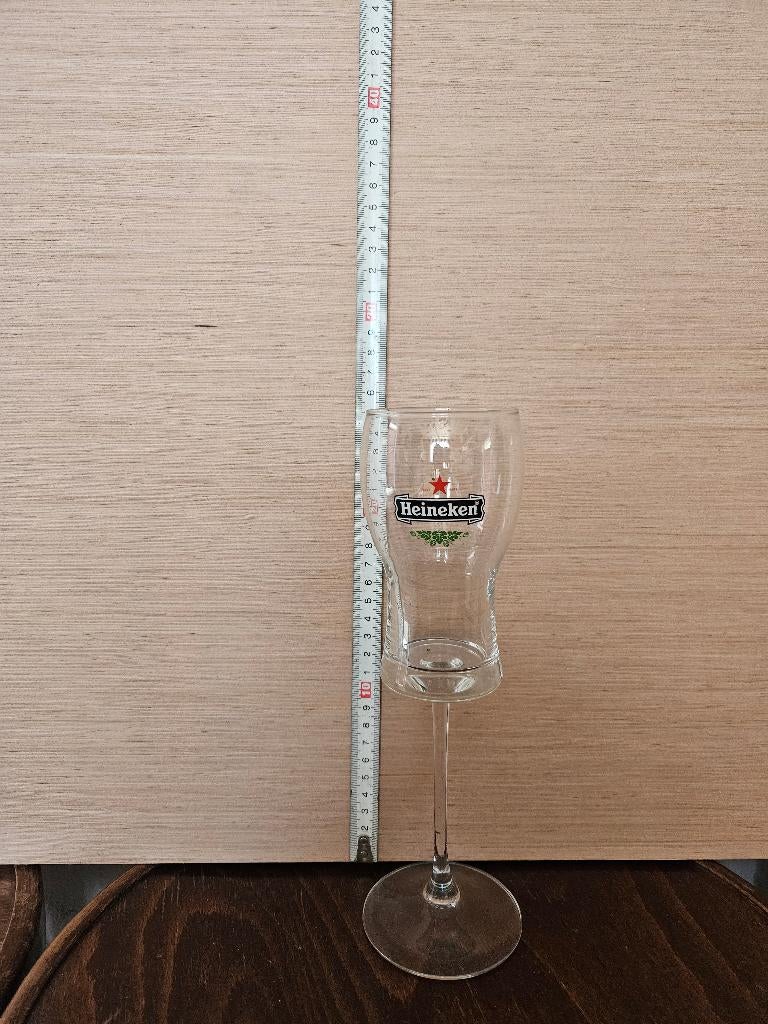 Heineken tapglas op hoge voet 25cm, Ophalen, Gebruikt, Glas of Glazen, Heineken