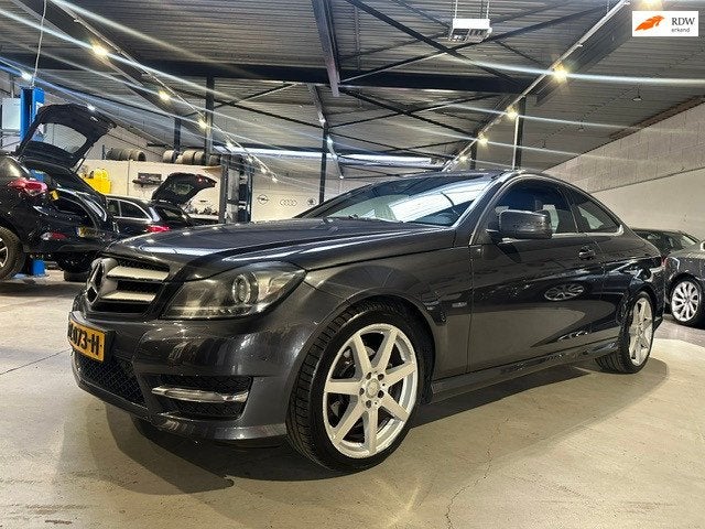 Mercedes-Benz C-klasse Coupé 250 Ambition/Amg pakket/Leder/, Auto's, Euro 5, Achterwielaandrijving, Gebruikt, 4 cilinders