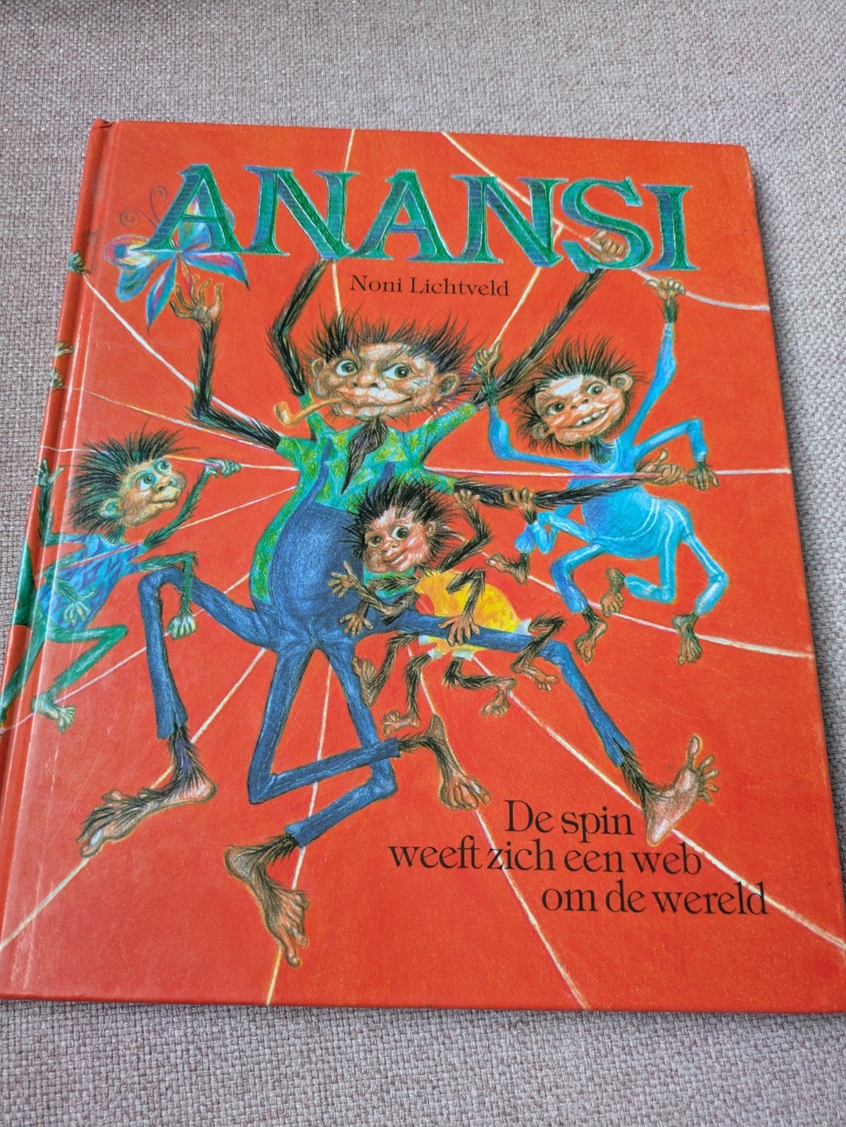 Anansi, de spin weeft een web om de wereld., Ophalen of Verzenden