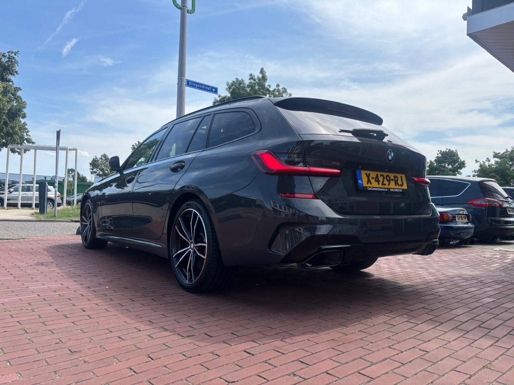 BMW 3 Serie Touring 320d xD. High Exec. leer pano automaat n, Auto's, Automaat, Euro 6, 4 cilinders, Leder