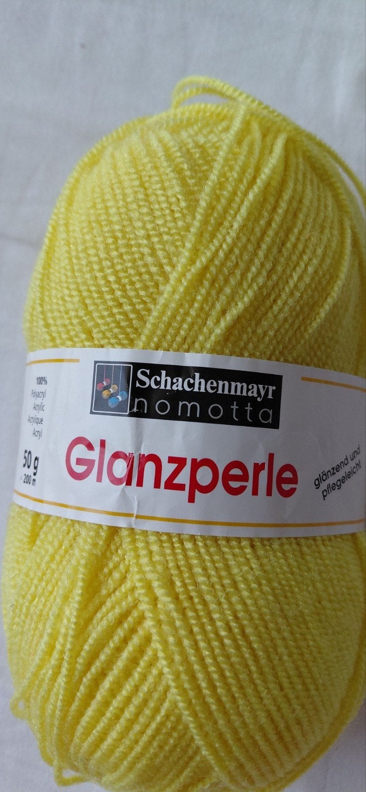 Schachenmayr Nomotta Glanzperle Geel Garen 50g, Ophalen of Verzenden, Nieuw, Breien of Haken, Wol of Garen
