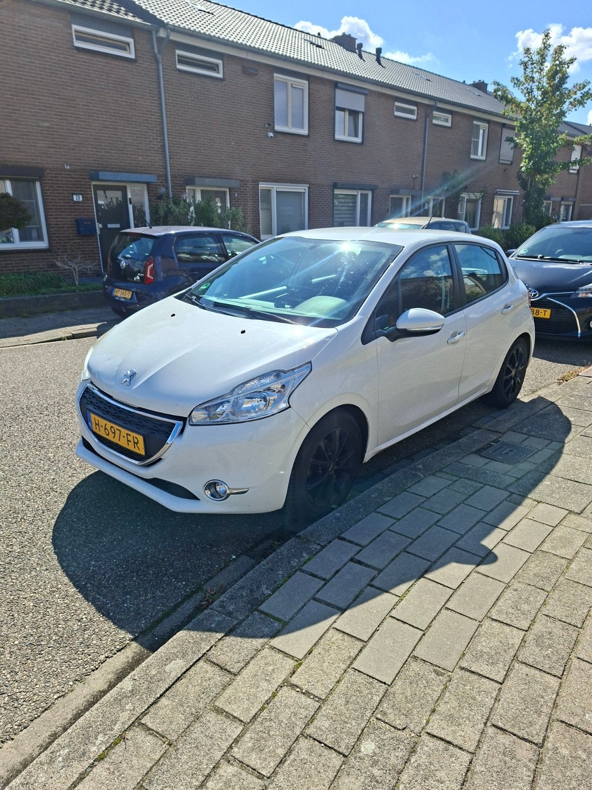 Peugeot 208 1.2 VTI 60KW/82PK 5-D 2013 Wit 133500, Voorwielaandrijving, 31 €/maand, 1199 cc, Wit