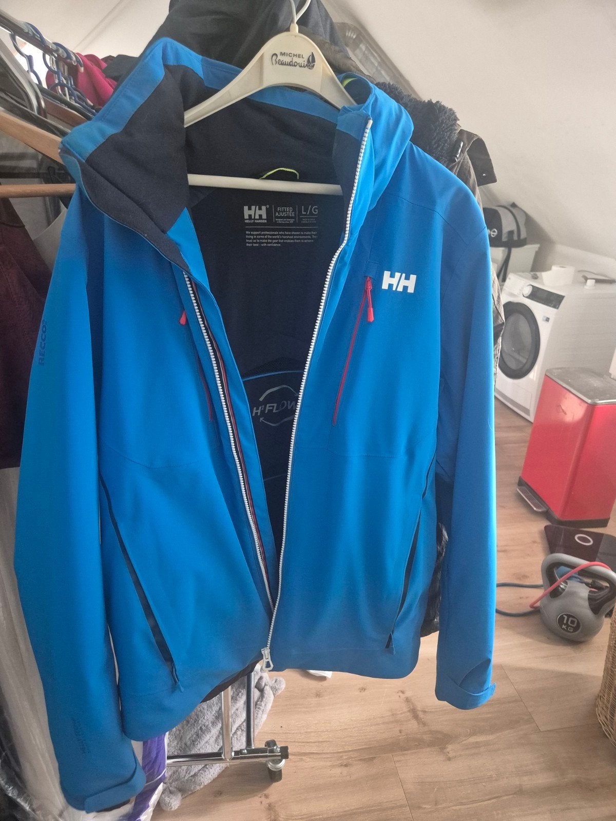Zo goed als nieuwe Helly Hansen jas - Maat L/G, Maat 52/54 (L), Helly Hansen, Blauw, Ophalen of Verzenden