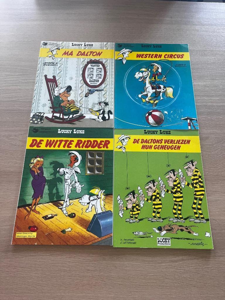 Lucky Luke - 4 stuks strips - Zo goed als nieuw, Eén stripboek, Ophalen of Verzenden, Zo goed als nieuw