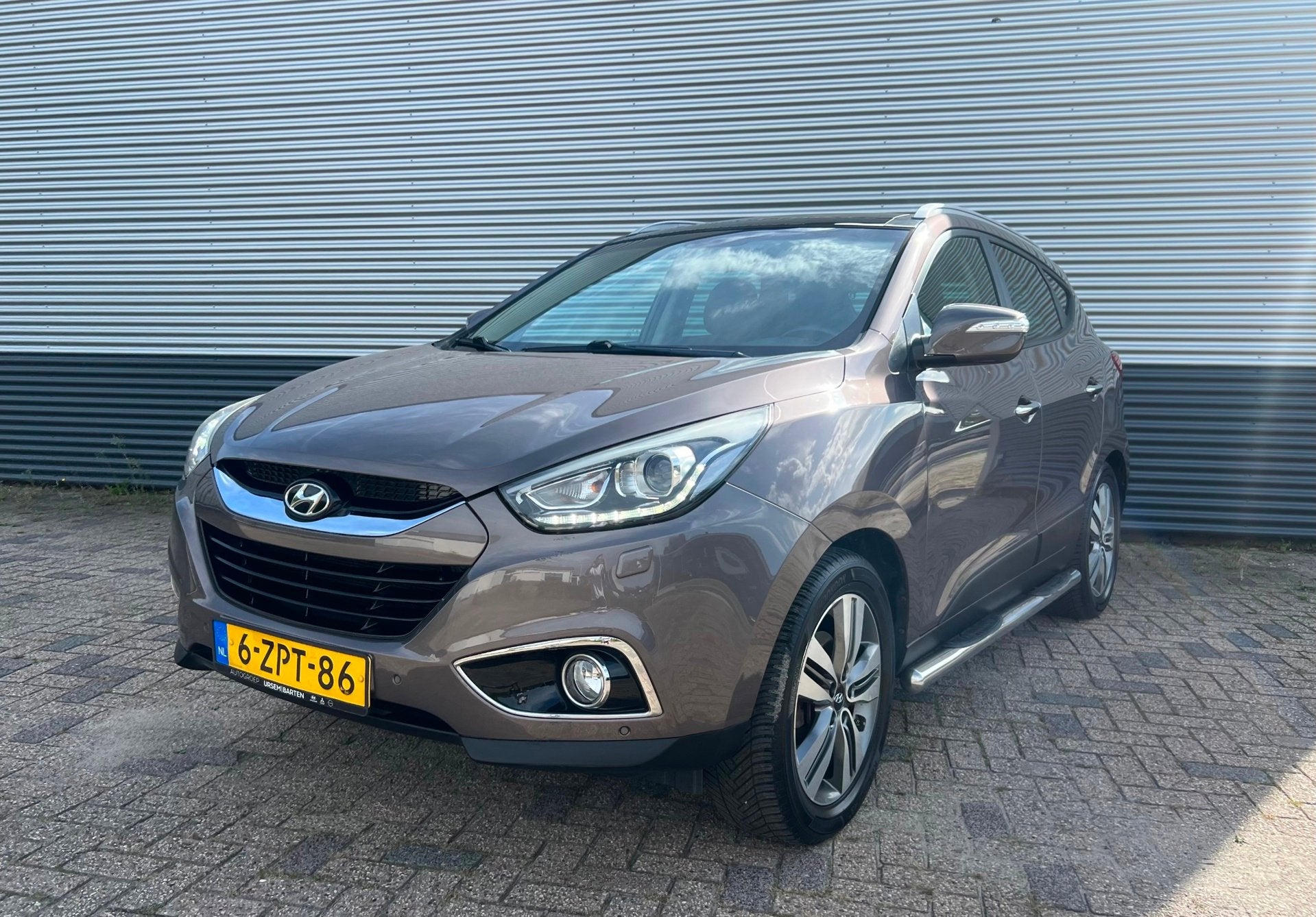 Hyundai Ix35 2.0i i-Catcher AUTOMAAT | PANO | TREKHAAK | CAM, Gebruikt, Zwart, 4 cilinders, Bruin
