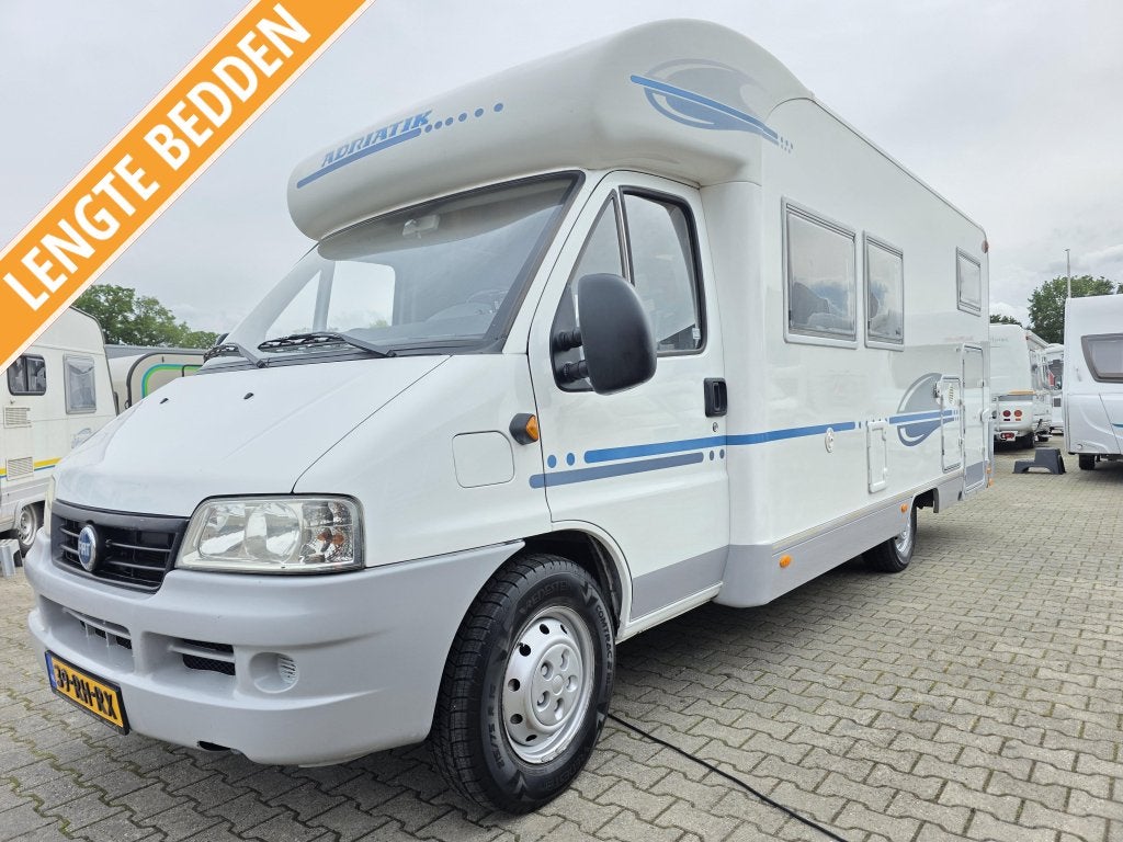 Adria Coral 660 SL CAMPER Lengtebedden 2.8JTD AUTOMAAT 2005, Caravans en Kamperen, Campers, Bedrijf, tot en met 3, Half-integraal