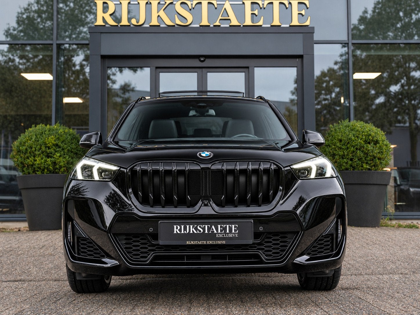 BMW X1 xDrive23i|PANO|H&K|M-PAKKET|HEAD-UP|360°|SFEER|MEMOR, Auto's, Gebruikt, 4 cilinders, Zwart, Leder
