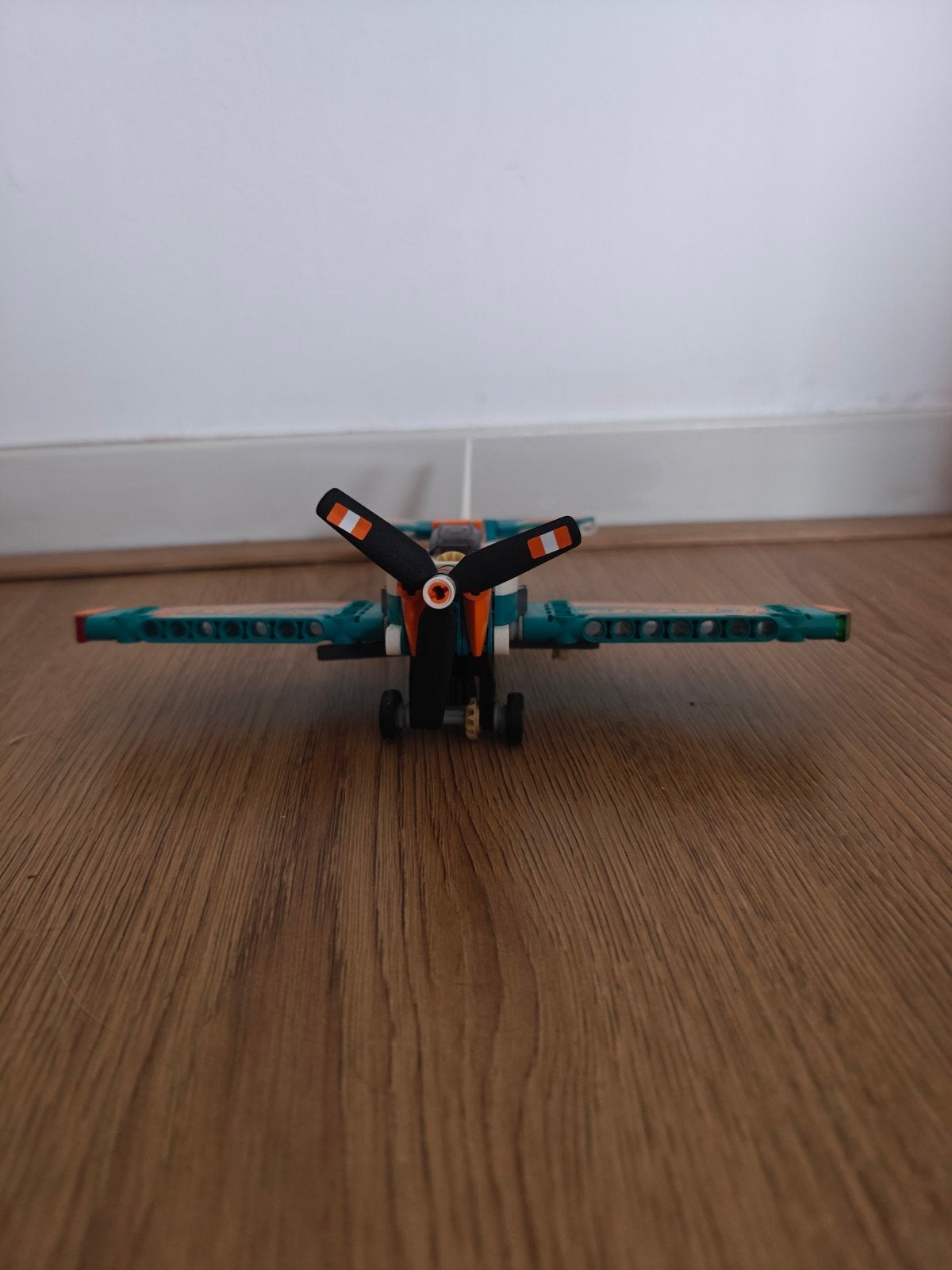 Lego vliegtuig - Oranje en groen stuntvliegtuig, Ophalen