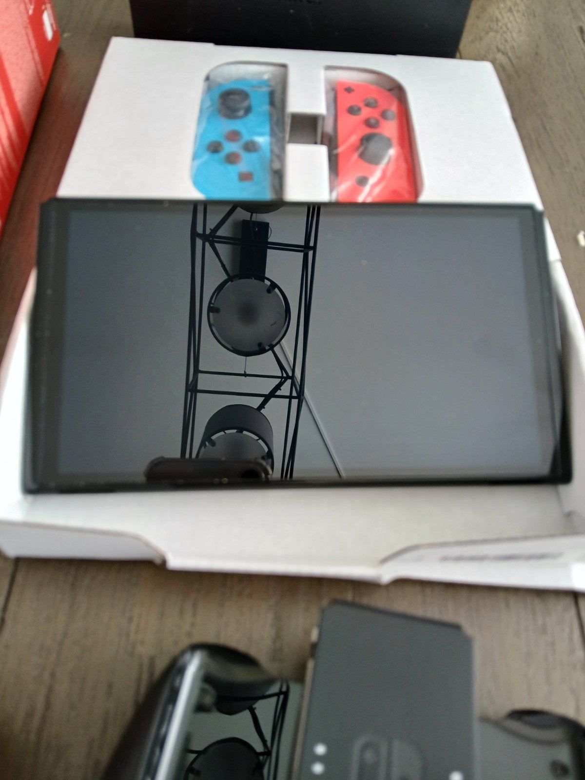 Foto 3 van Nintendo Switch OLED met 3 games en accessoires