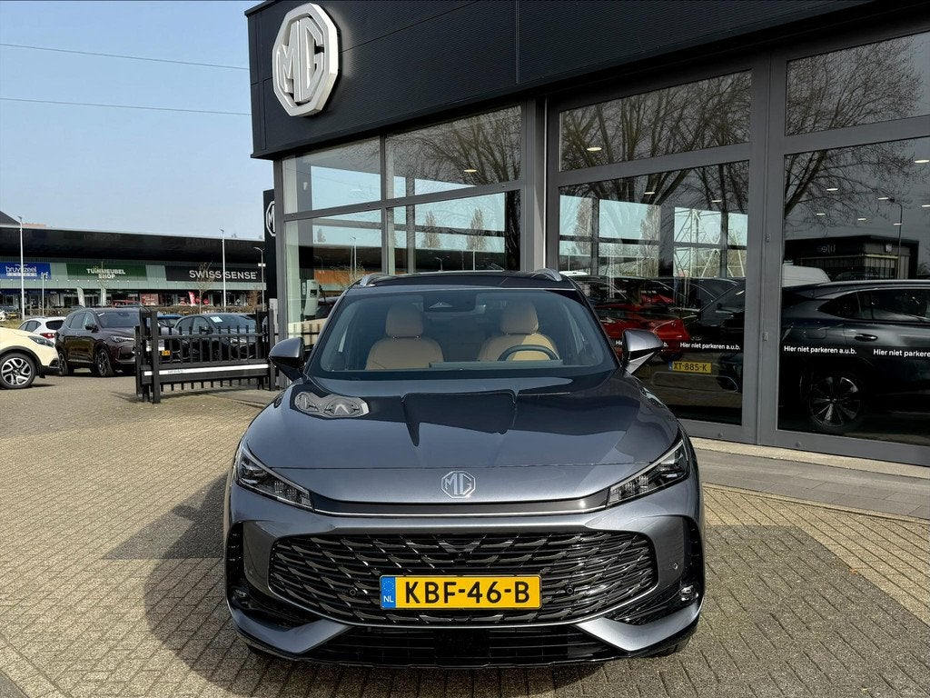 MG HS PHEV 1.5 272pk Aut. Luxury | 100km Electrisch | Bruin, Auto's, MG, 12 maanden, Gebruikt, 4 cilinders, 21 kWh