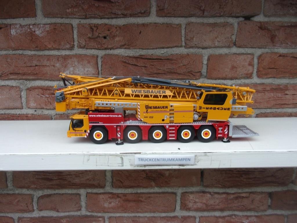 WSI  Liebherr  MK  140  van  Wiesbauer., Hobby en Vrije tijd, Modelauto's | 1:50, Ophalen of Verzenden, Nieuw, Hijskraan, Tractor of Landbouw