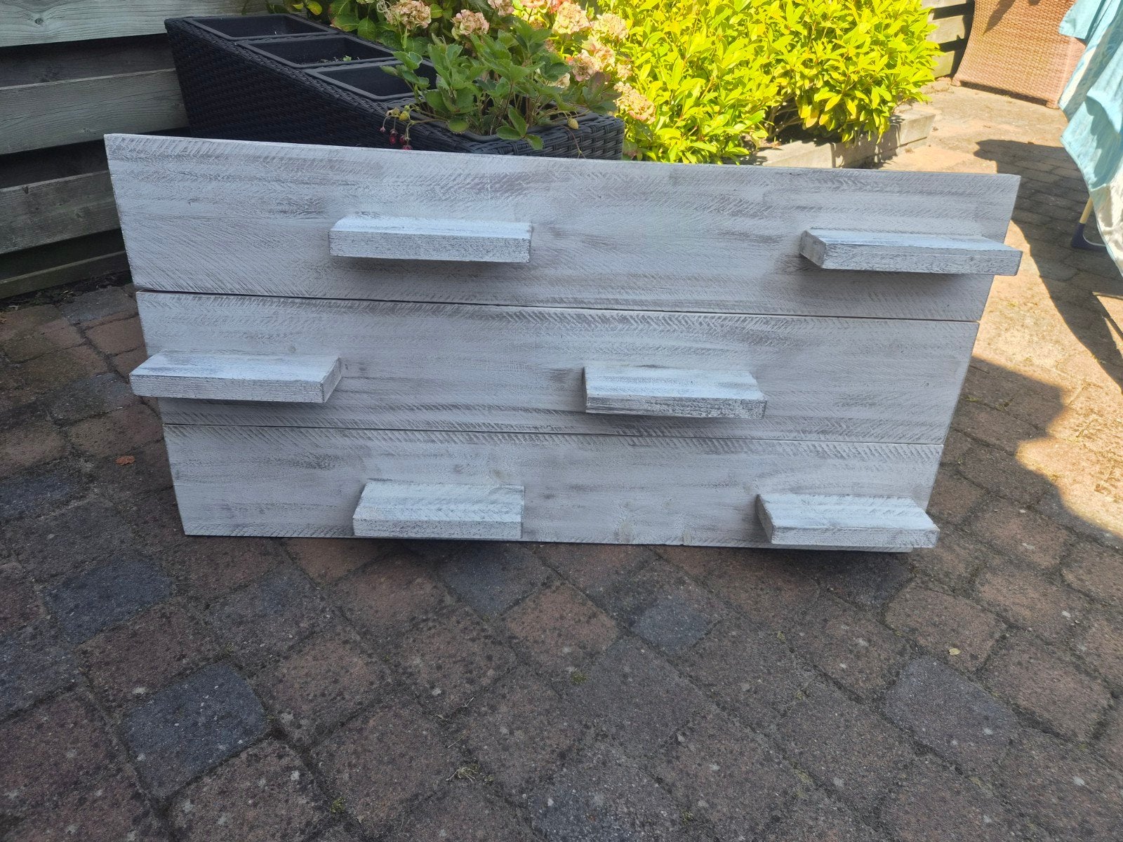 Steigerhouten wandplank, Ophalen