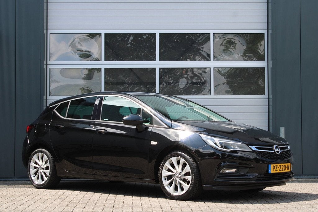 Opel Astra 1.4 Innovation 150pk Clima/Cruise/Camera/Stoel&St, Auto's, Opel, Gebruikt, 150 pk, Zwart, Bedrijf
