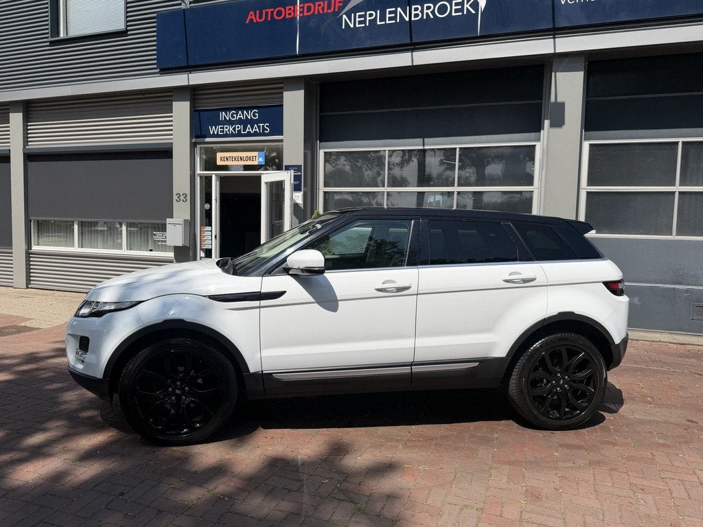 Land Rover Range Rover Evoque 2.0 Si 4WD Prestige Automaat,L, Auto's, Land Rover, Automaat, Euro 5, Zwart, 4 cilinders