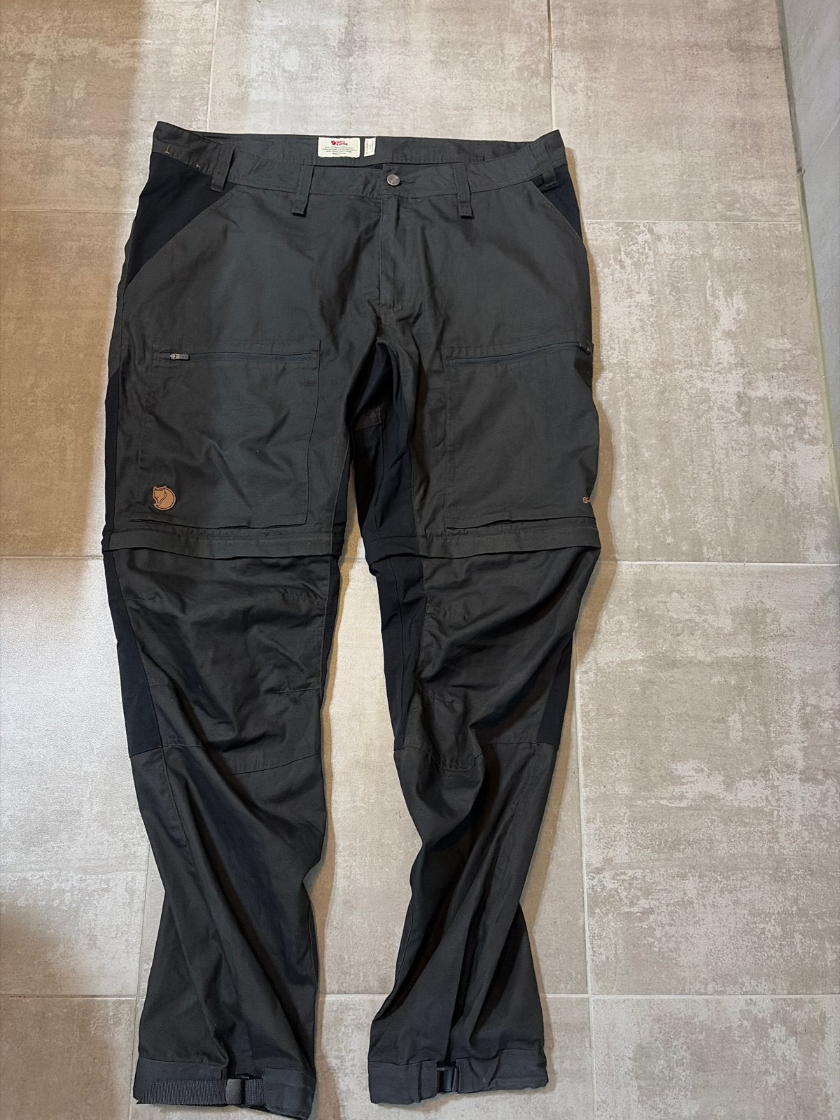 Fjällräven Abisko Lite Trekking Zip-off M Reg - Zo goed als, Ophalen of Verzenden, Zo goed als nieuw, Maat 56/58 (XL), Zwart