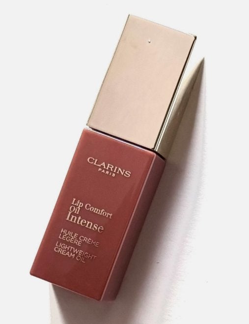 Clarins lip comfort oil intense 01 intense nude, Ophalen of Verzenden, Nieuw, Roze, Handen en Nagels