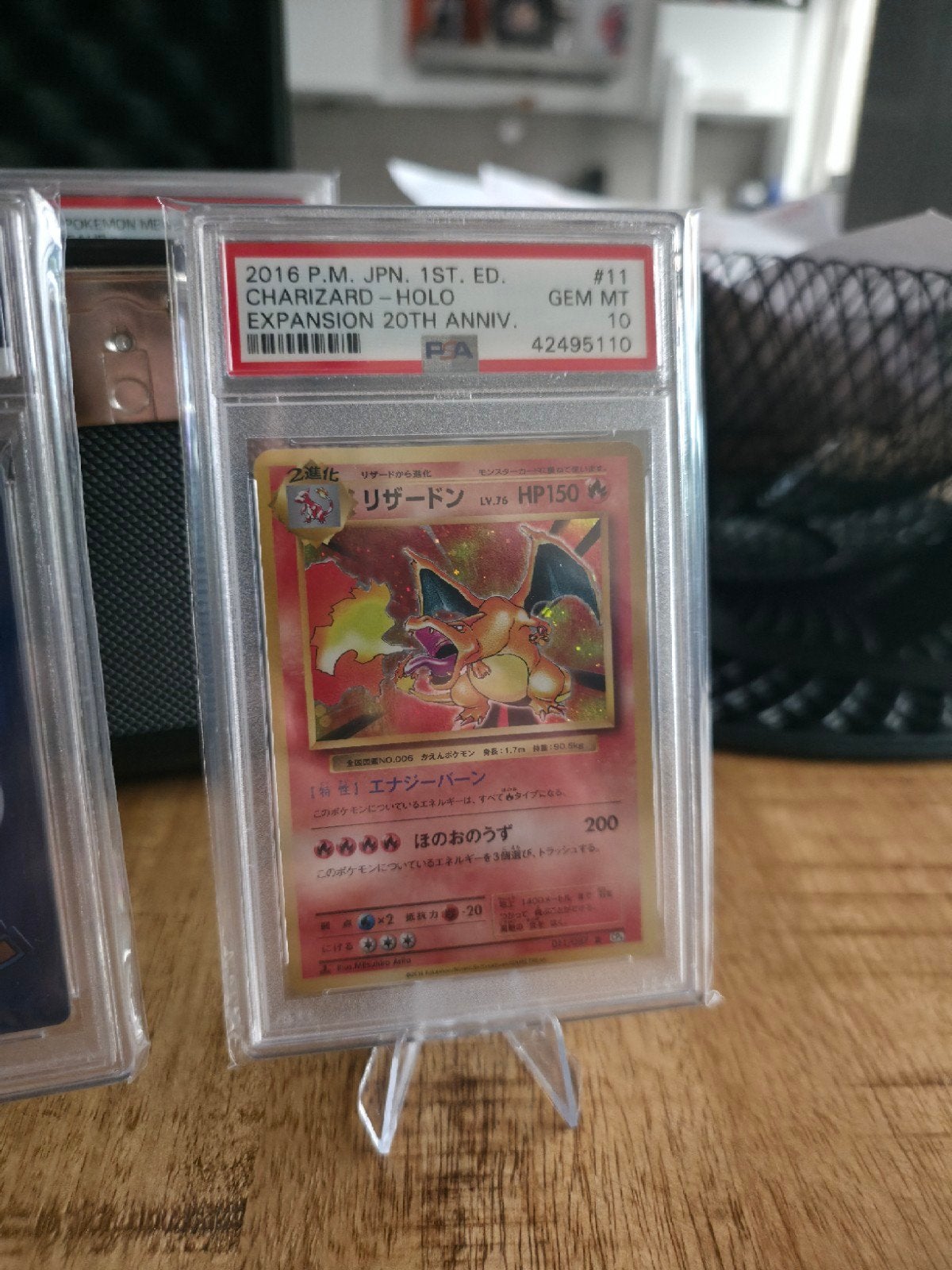 Charizard #11 2016 Jap 1st Ed 20th Ann PSA 10, Ophalen of Verzenden, Zo goed als nieuw, Losse kaart, Foil