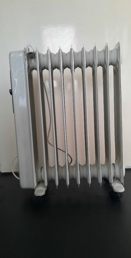 Oliegevulde radiator kachel, Ophalen, 30 tot 80 cm, Gebruikt, Kachel