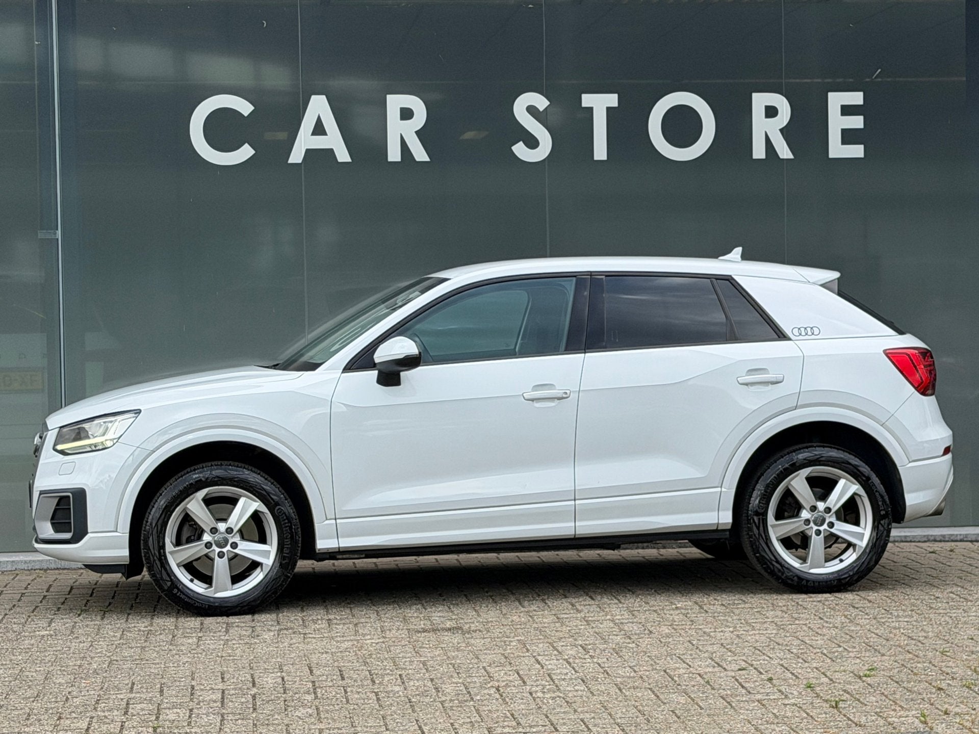 Audi Q2 1.4 TFSI CoD Design Pro Line Plus 100% Dealer onderh, Auto's, Stof, 4 cilinders, 150 pk, Wit