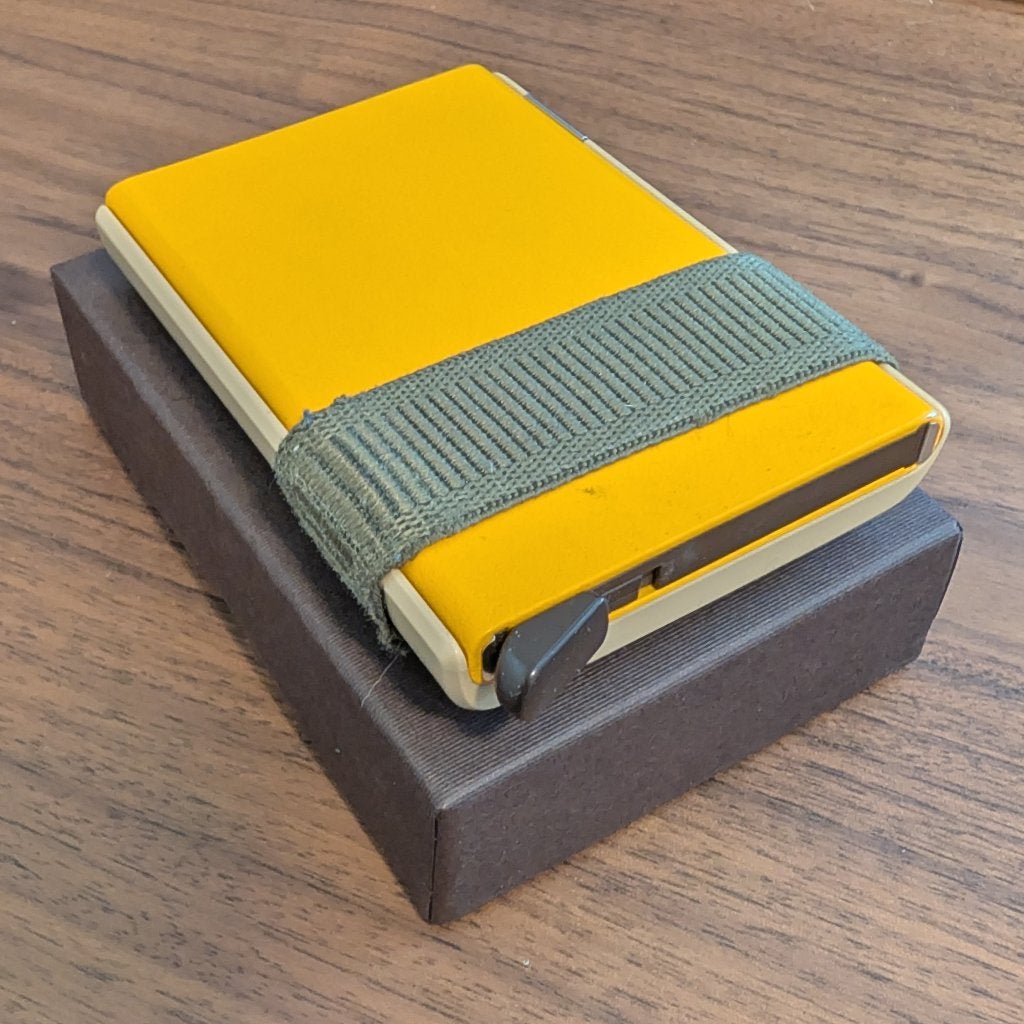 Secrid Cardslide Kaarthouder, Ophalen of Verzenden, Gebruikt, Geel, Met knipsluiting