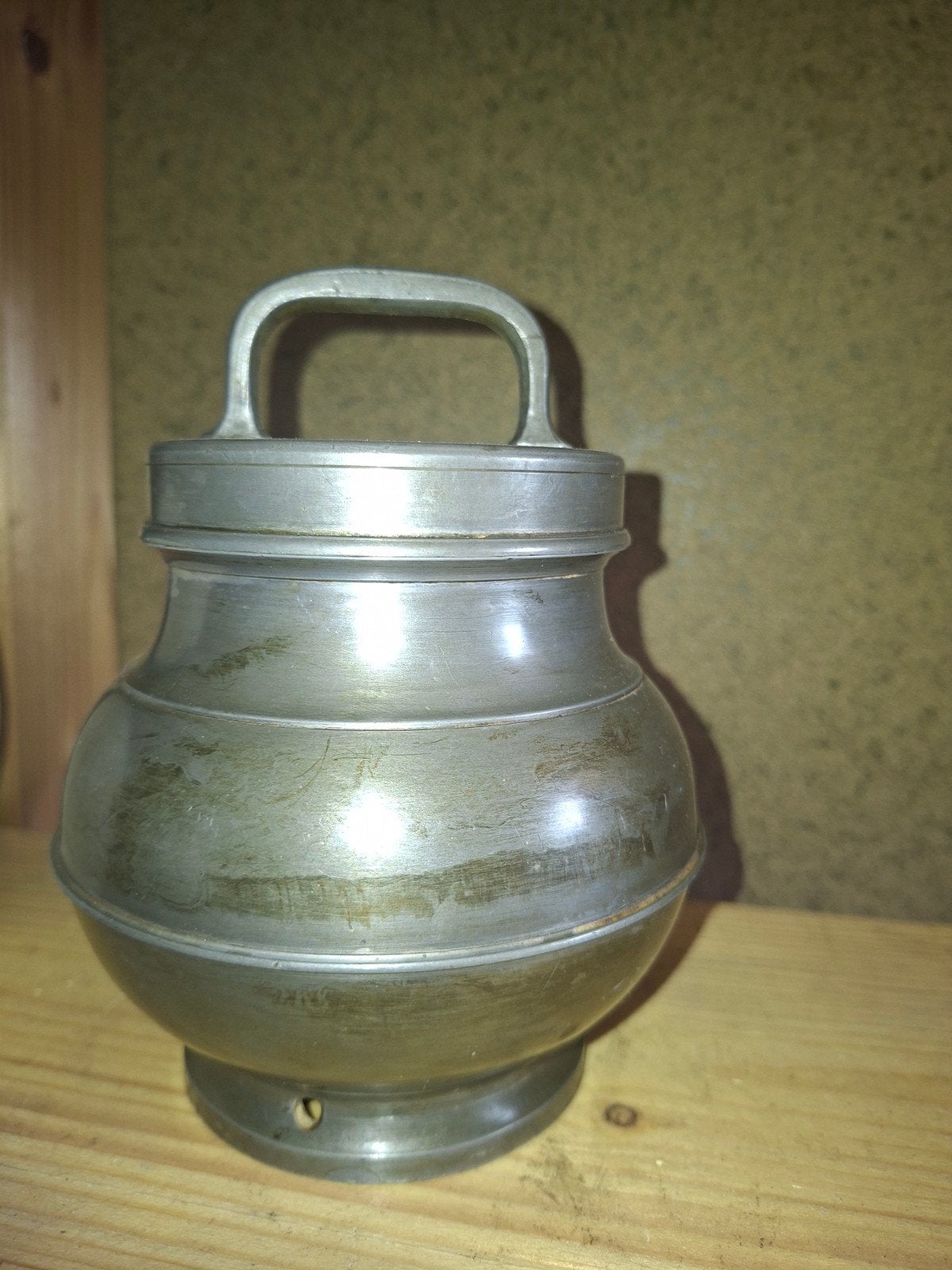 Antiek tinnen pot, Ophalen