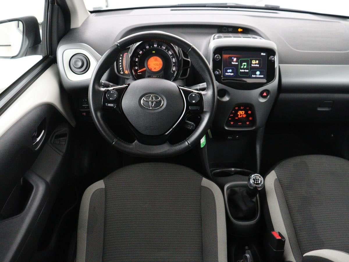 Toyota Aygo 1.0 VVT-i x-joy | Carplay | Camera | DAB | Clima, Auto's, Voorwielaandrijving, Stof, Gebruikt, Euro 6