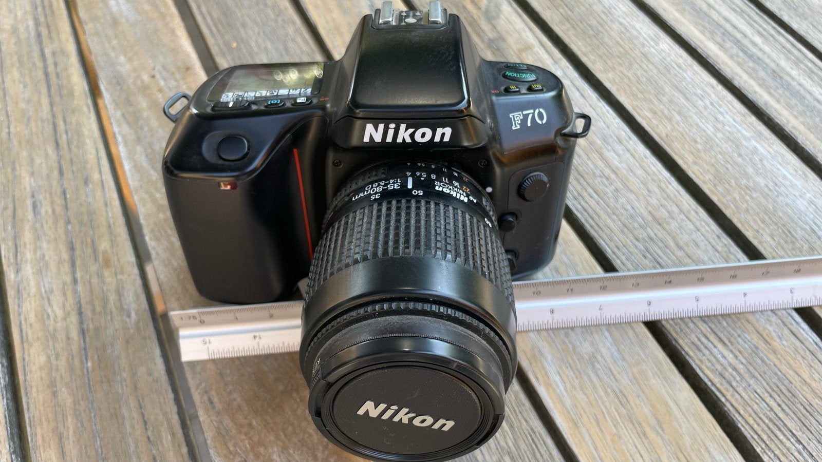 Nikon F70 Spiegelreflexcamera met AF Nikkor 35-80mm lens, Audio, Tv en Foto, Fotocamera's Analoog, Ophalen, Gebruikt, Spiegelreflex