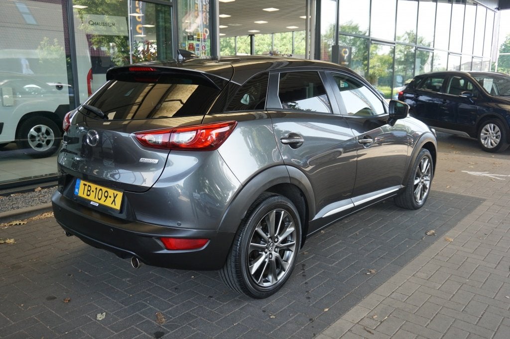 Mazda CX-3 2.0 SkyActiv-G 120 GT-Luxury | Cruise | Camera |, Auto's, Mazda, Gebruikt, Euro 6, 4 cilinders, Leder en Stof