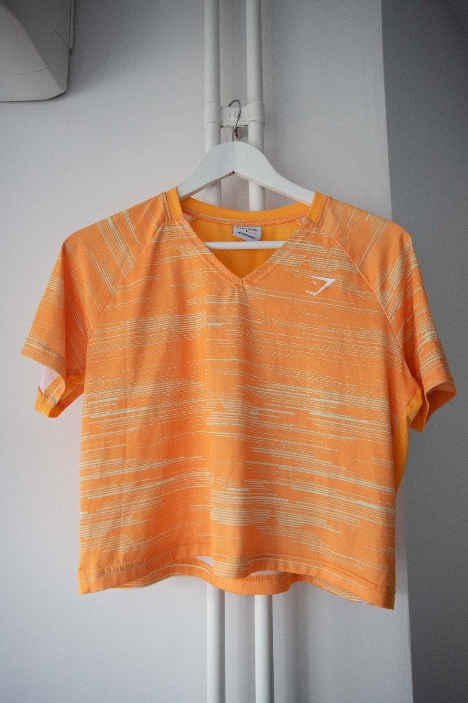 Cropped oranje sportshirt Gymshark maat L, Oranje, Ophalen of Verzenden, Zo goed als nieuw, Gymshark