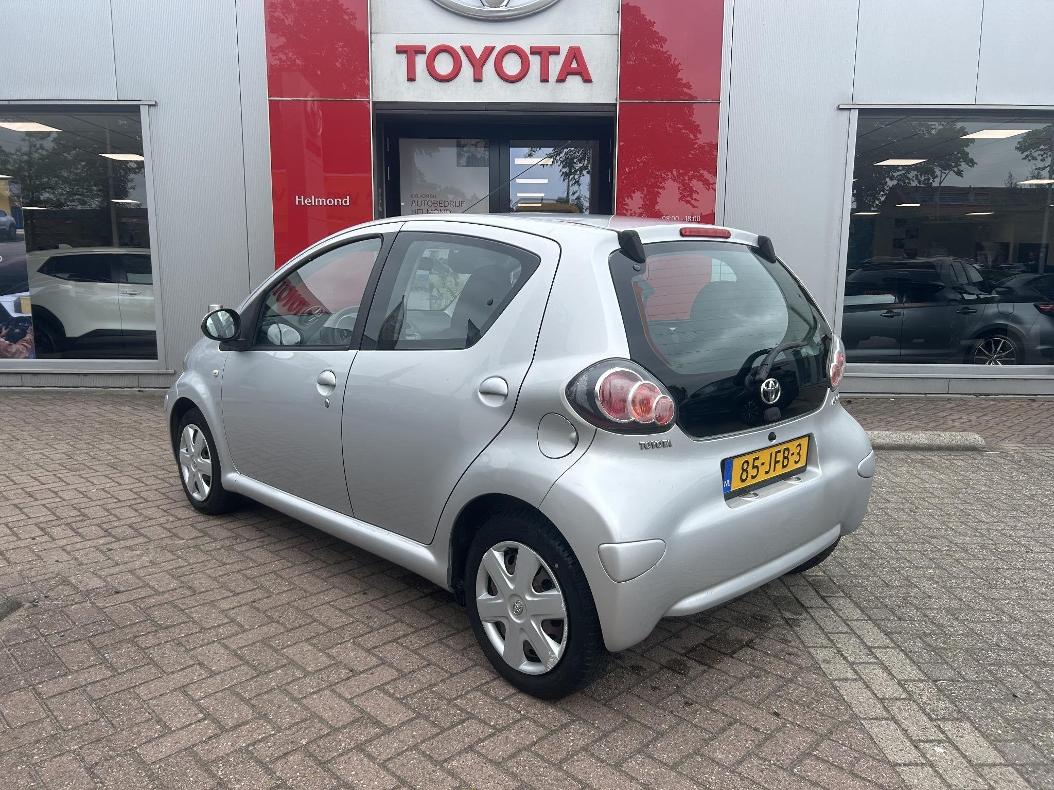 Toyota Aygo 1.0-12V Comfort | Allweather banden | Airco | Pe, Voorwielaandrijving, Stof, Gebruikt, 4 stoelen