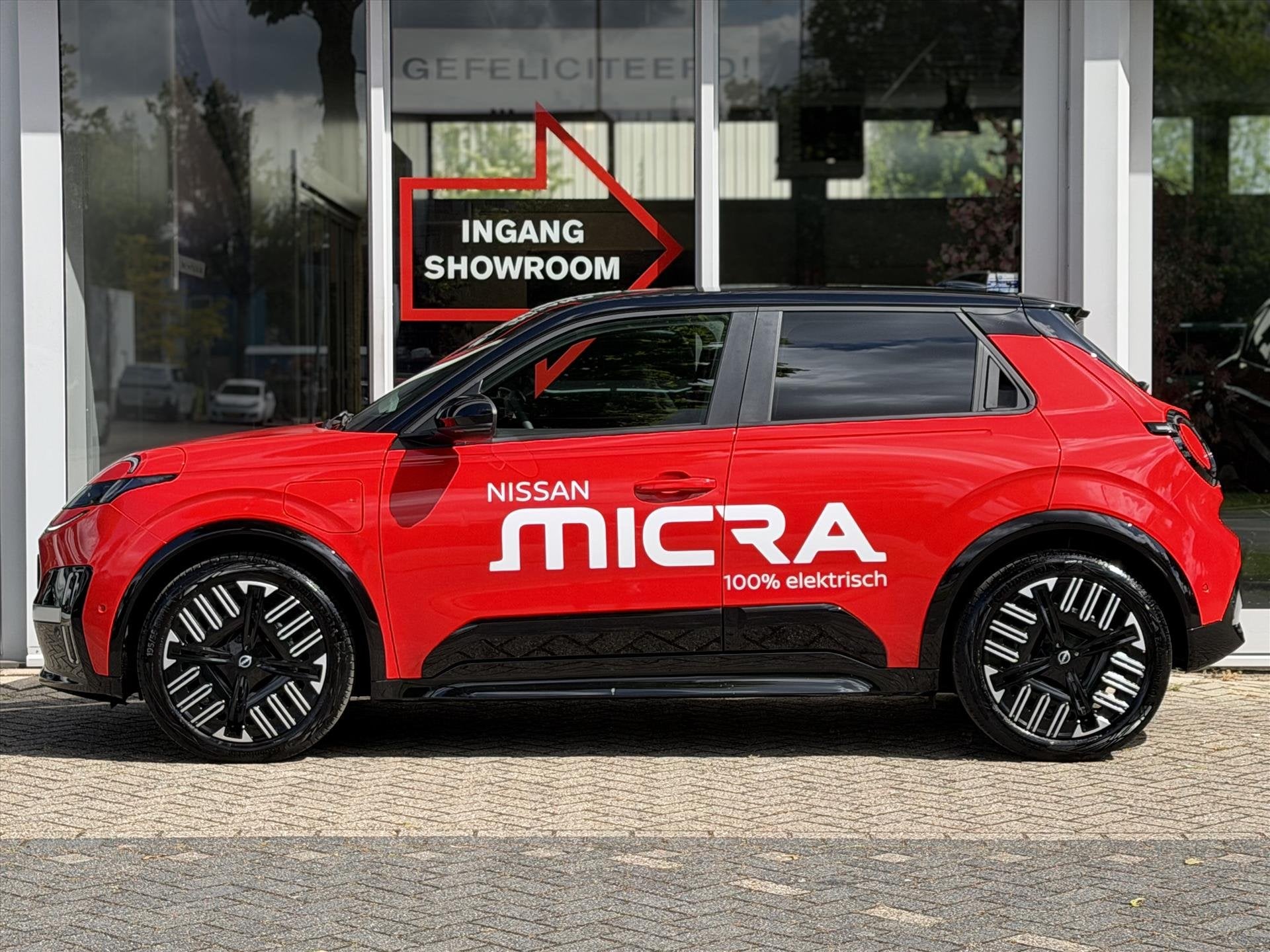Nissan Micra 52 kWh Advance - Launch Edition | 416km WLTP |, 12 maanden, Stof, Gebruikt, Zwart