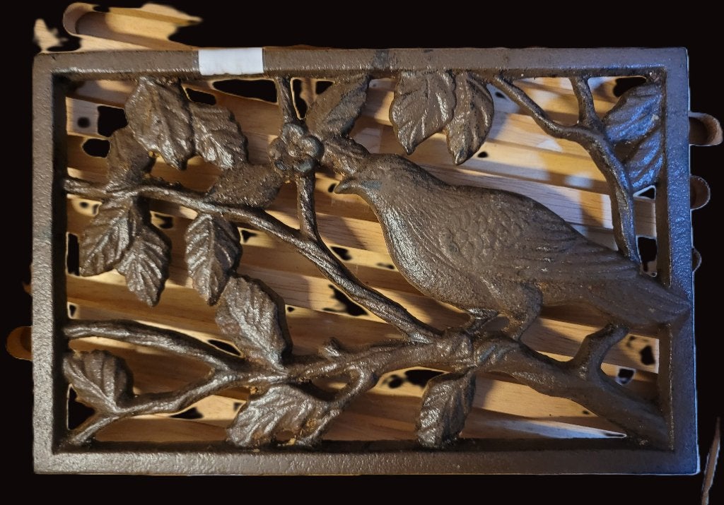 2 Smeedijzeren onderzetters met vogel (per stuk), Ophalen of Verzenden