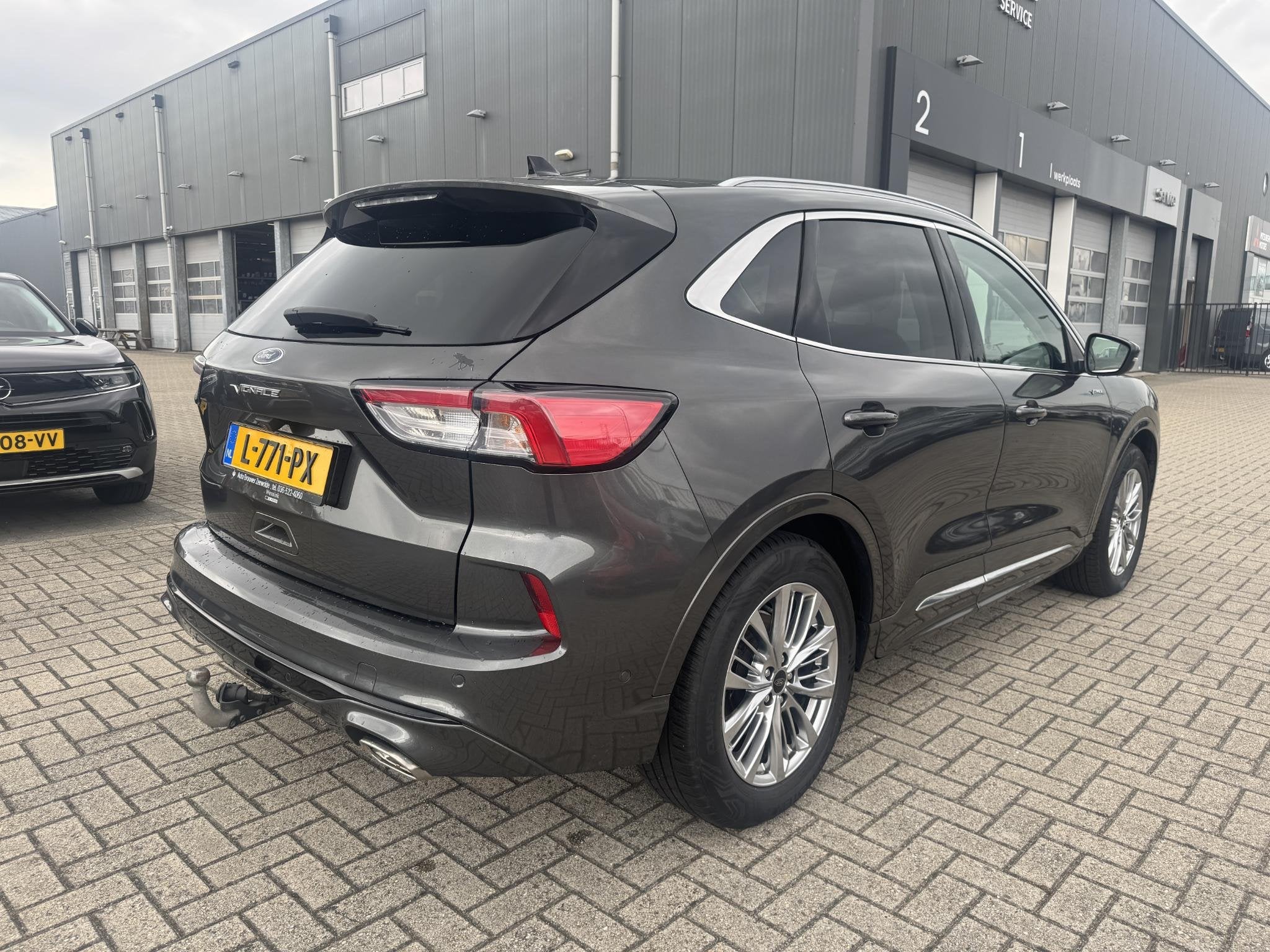Ford Kuga 2.5 PHEV Vignale | Pano | Carplay | Camera | Leer, Auto's, 14 kWh, Gebruikt, 4 cilinders, Met garantie (alle)