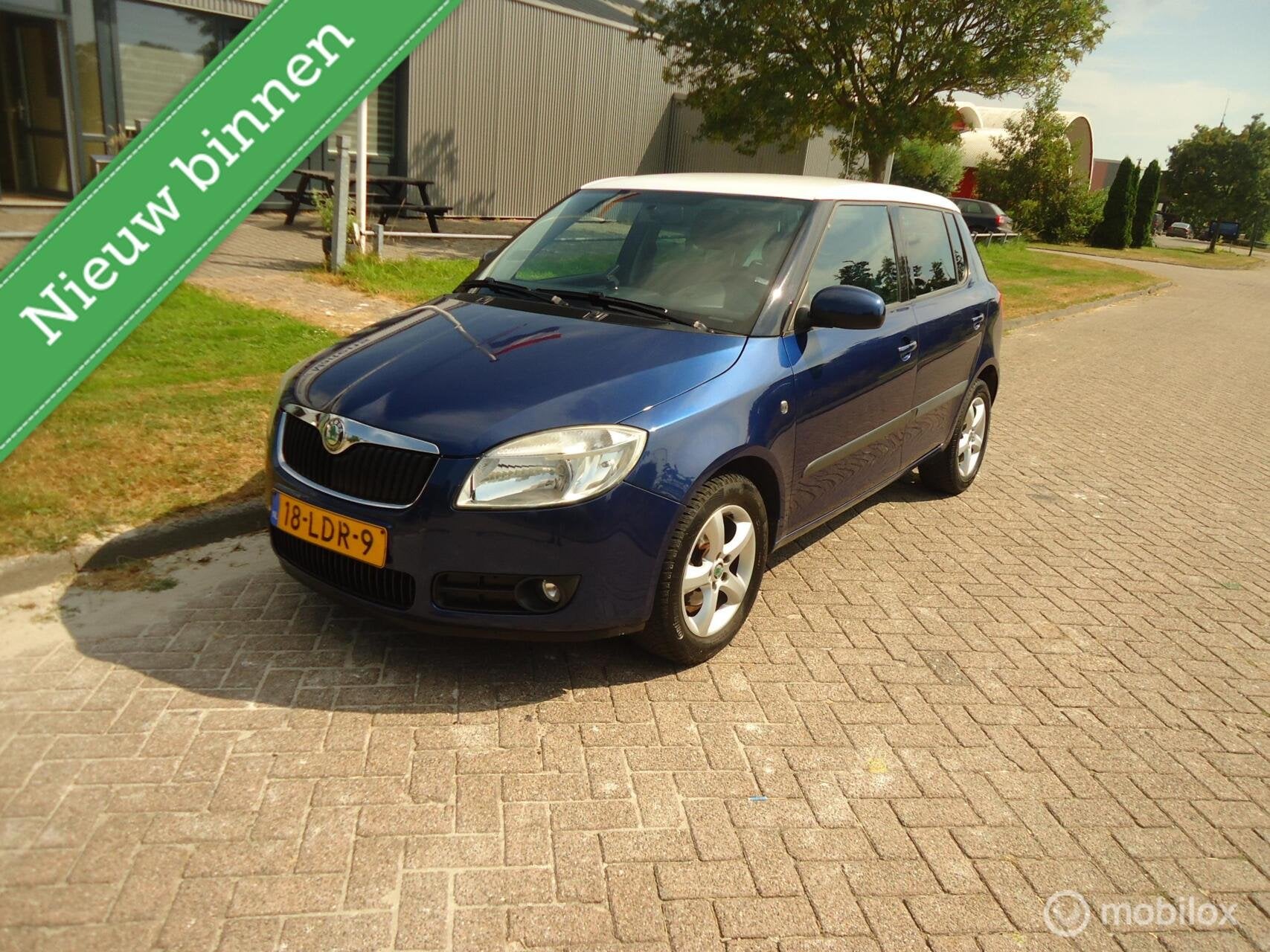 Skoda Fabia 1.4-16V Ambition Business Line, Auto's, Skoda, Voorwielaandrijving, 4 cilinders, Blauw, Origineel Nederlands