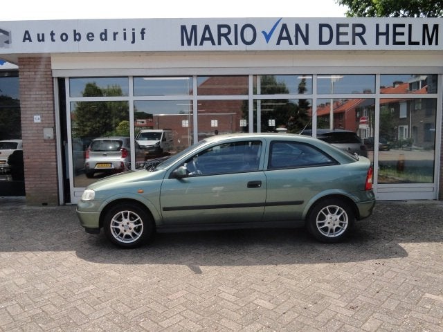 Opel Astra 1.6 GL, Auto's, Opel, Stof, Zwart, 4 cilinders, Airbags