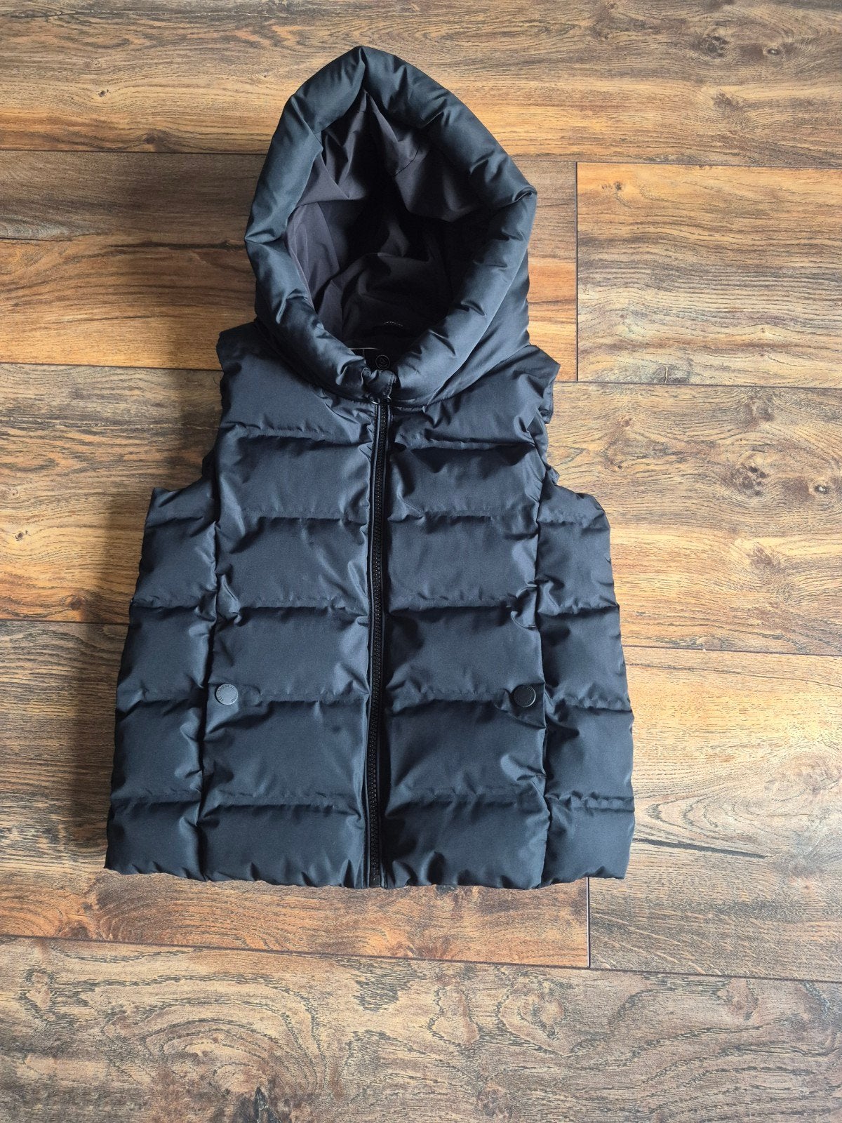 Mooie zwarte bodywarmer maat 134, Kinderen en Baby's, Kinderkleding | Maat 134, Jongen of Meisje, Ophalen of Verzenden, Zo goed als nieuw