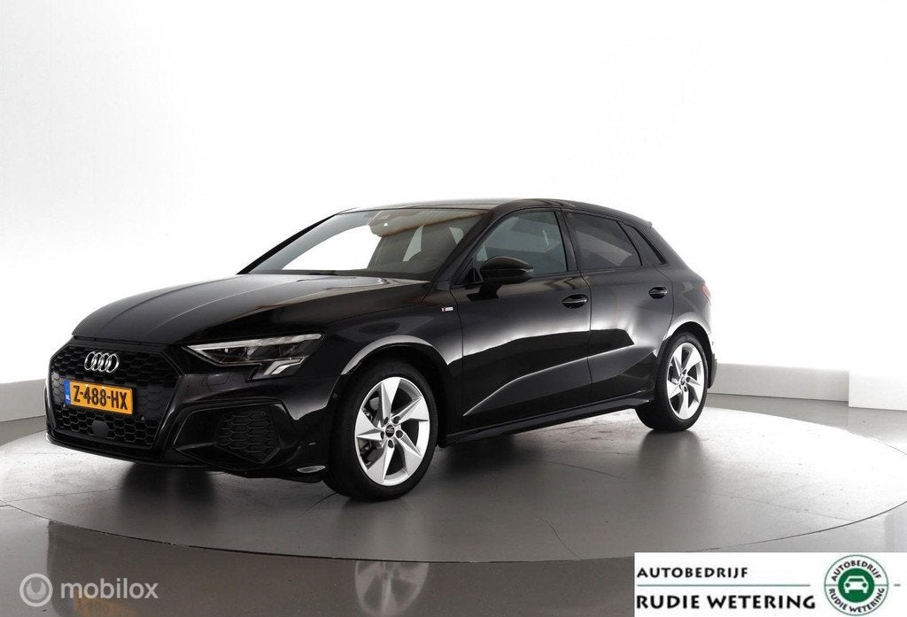 Audi A3 Sportback 35 TFSI 150PK S-line NLAuto|trekhaak|stoel, Lichtsensor, 4 cilinders, Leder en Stof, Zwart