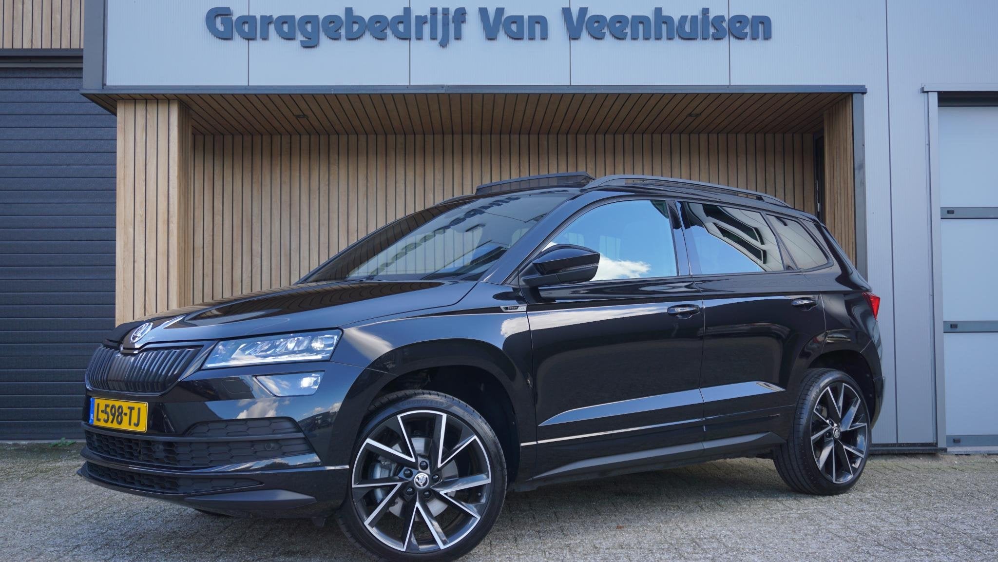 Skoda Karoq 1.5 TSI 150PK Sportline Business *Black Style* P, Stof, 4 cilinders, Zwart, Bedrijf